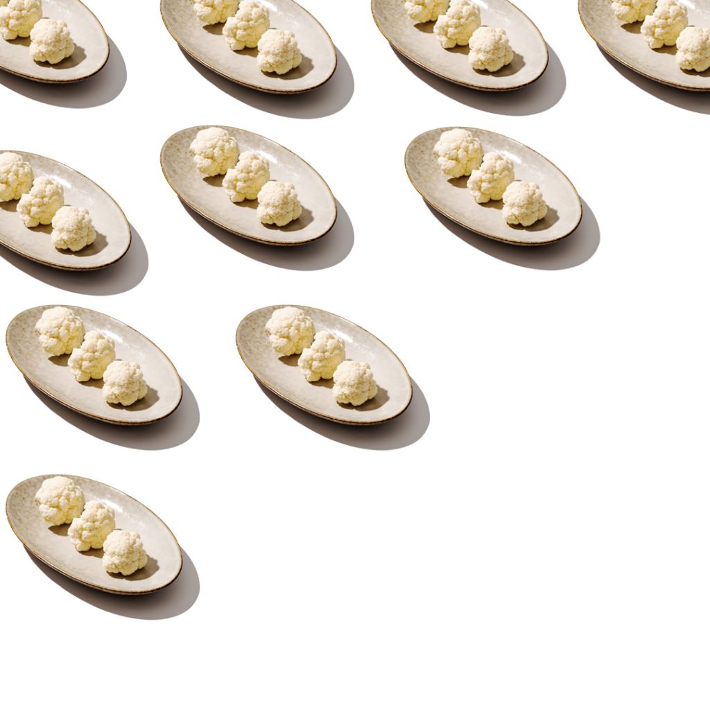 Graphic pattern made of cauliflower on a beige plate